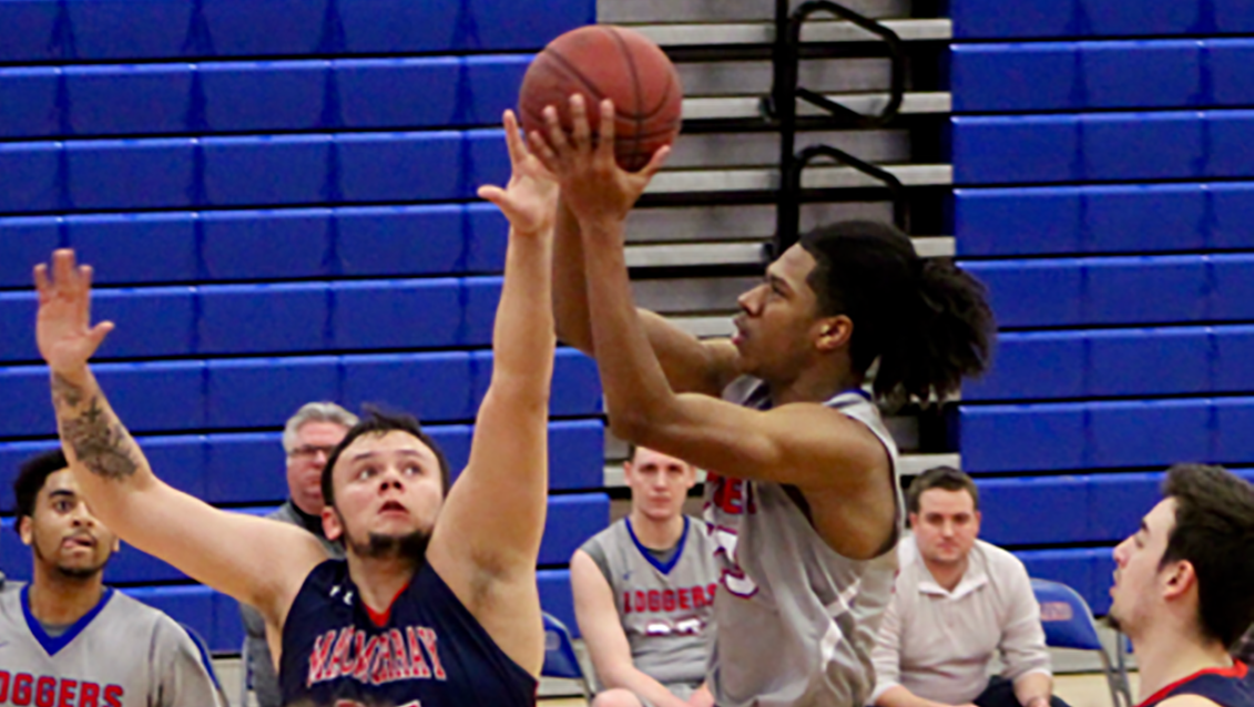 Basketball player taking a jump shot