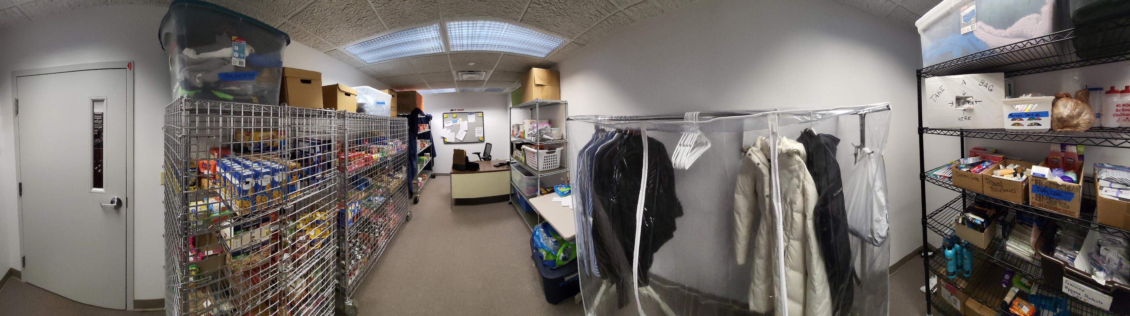 Photo of shelves and supplies in food pantry