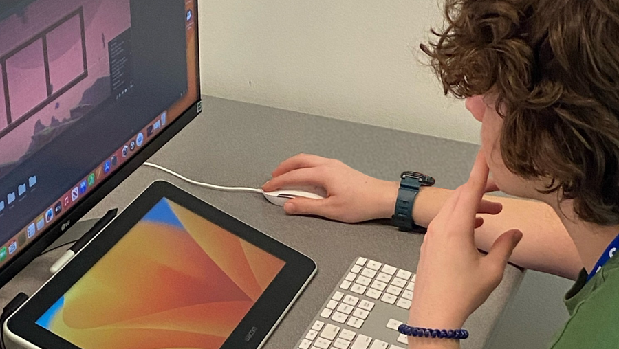 Student working with graphics on a computer