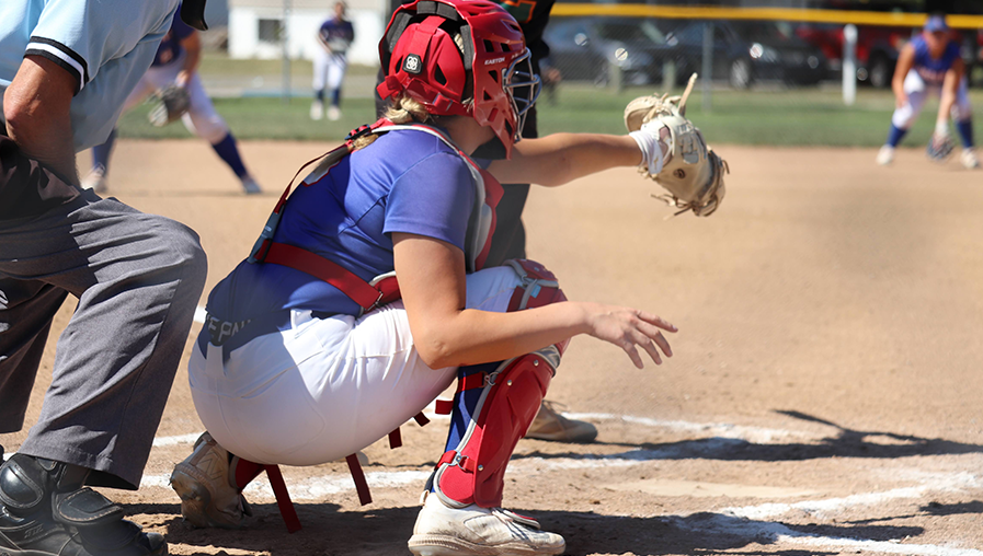 softball catcher at home plate