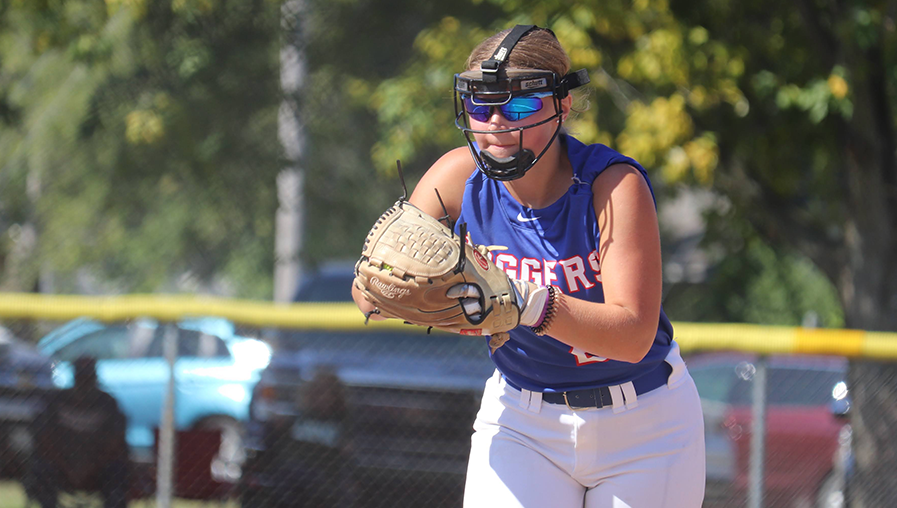 softball pitcher pitching a ball