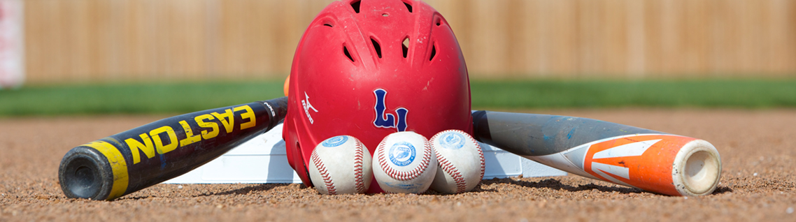 LLCC baseball helmet posed with bats and balls.