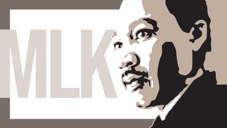MLK with a photo of Martin Luther King Jr.
