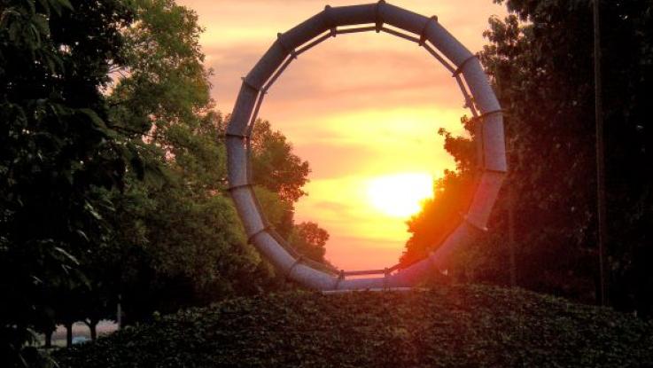 Sculpture La Terra at sunset