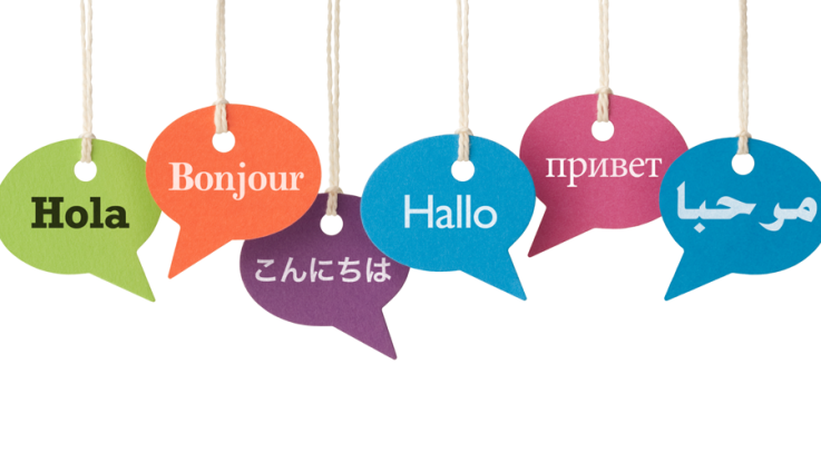 Colorful conversation bubbles that read "Hola" "Bonjour" "Hallo"
