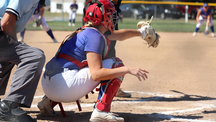 softball catcher at home plate