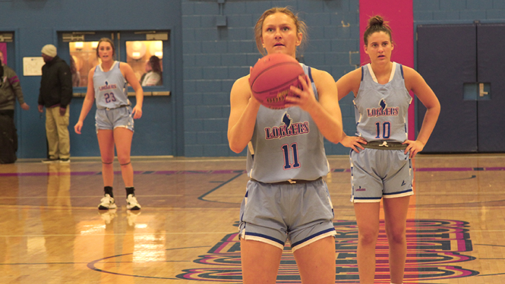 female basketball player shooting free throw