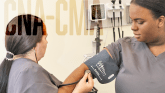 CNA to CMA Bridge program with two students taking blood pressure.
