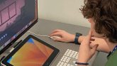 Student working with graphics on a computer