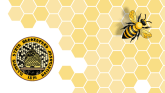 A hive with a bee and the logo for the Prairie State Beekeepers Association
