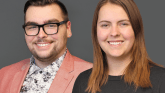 Two people on a gray background