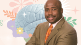 Person in brown suit with orange tie, arms crossed, against a pastel background with an illustrated brain and floral shapes.