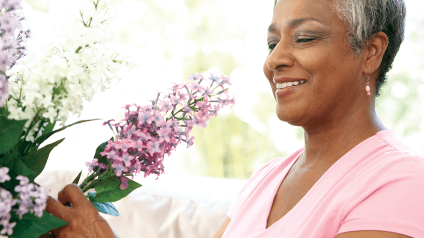 Woman arranging flowers