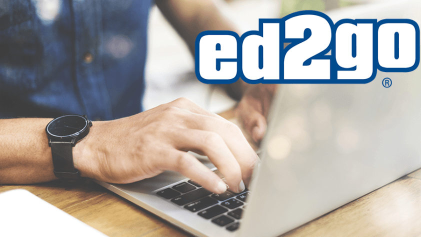 ed2go logo in upper right corner; man typing on laptop computer