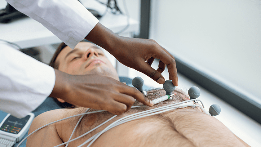 student using an ECG machine