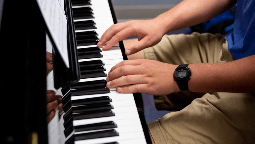 student playing piano