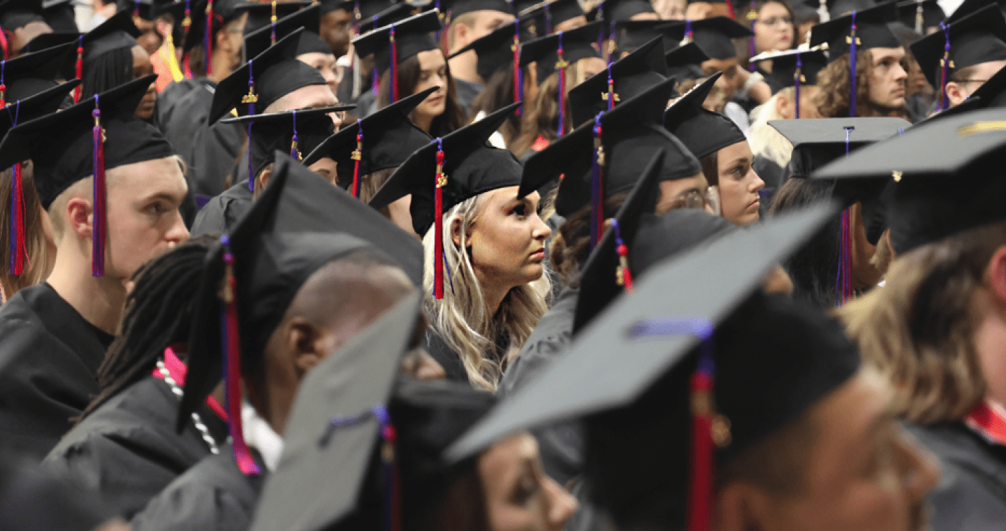 LLCC graduates sitting at the 2024 Commencement ceremony.