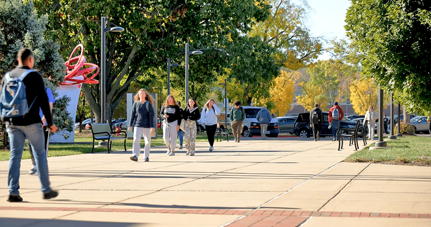students walking on LLCC campus