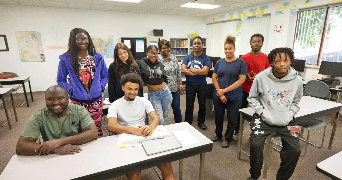 Group of LLCC Adult Education students gathered in a classroom