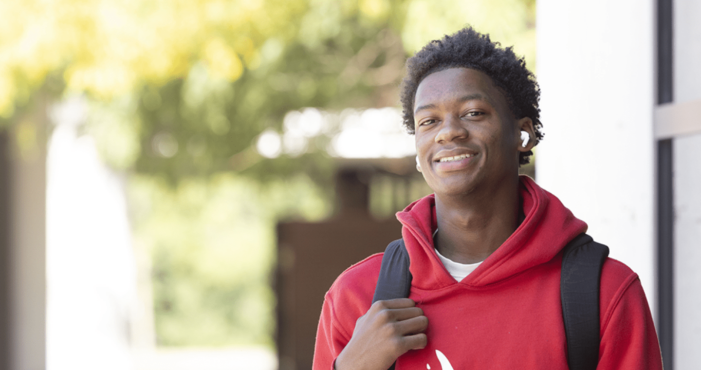Student in a red sweatshirt