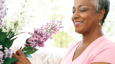 Woman arranging flowers