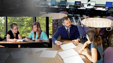 Staff assisting student in the Writing Center