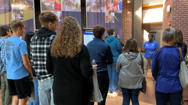 Recruiter giving students and parents a tour