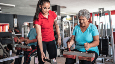 personal trainer with a client