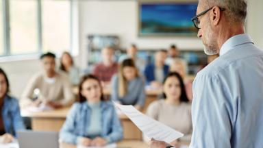 Classroom with a teacher in front