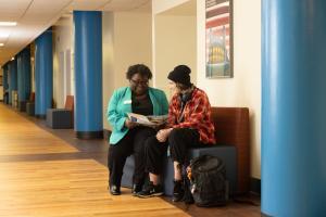 Dr. Amanda Turner meets with art student Emily Dulceak.