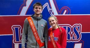 2024 Homecoming Royals Dane Foster and Olivia Marchizza. They are wearing red sashes that say "Homecoming Royalty" in gold lettering.