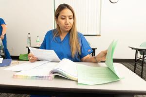 CNA student studying for an exam.