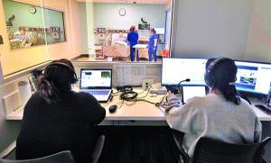 students practicing skills in a nursing simulation lab