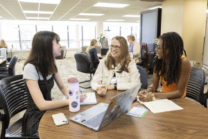TLC staff meeting with students