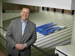 Dr. Curt Oldfield with LLCC logo in background