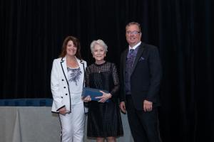 A person receiving an award.