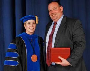 Bruce Compton with Dr. Charlotte Warren at Commencement