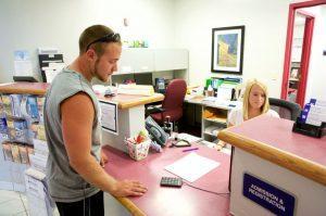 Adrienne-and-student-300x199.jpg LLCC-Litchfield staff working with student