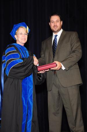 Andrew Thoron with Dr. Charlotte Warren at Commencement