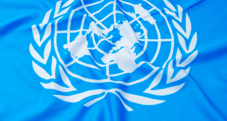 blue fabric with United Nations logo in white