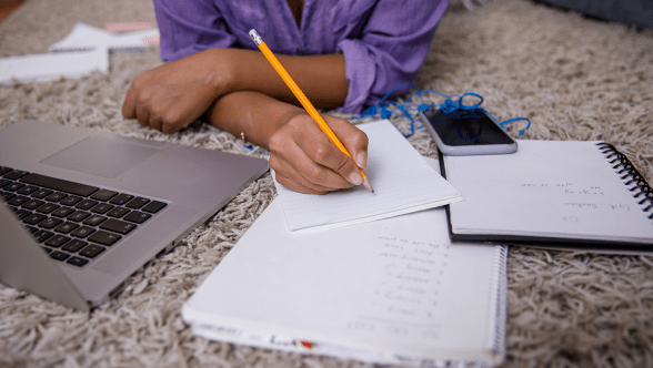 Student studying on a laptop