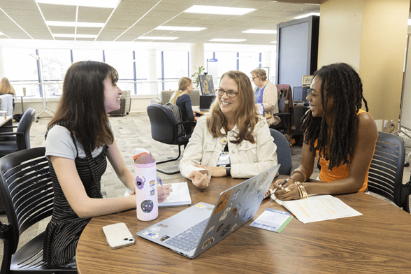 TLC staff meeting with students