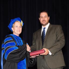 Andrew Thoron with Dr. Charlotte Warren at Commencement
