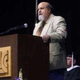 Jim Matheis addressing graduates at Commencement
